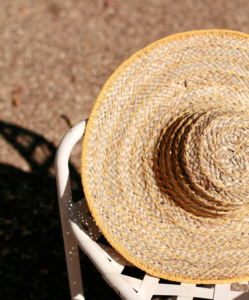 Balinese Pecatu Wide Round Straw Hat In Butter Yellow - Image 3