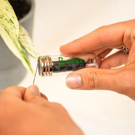 Bamboo Charcoal Floss in Glass Container - Image 4