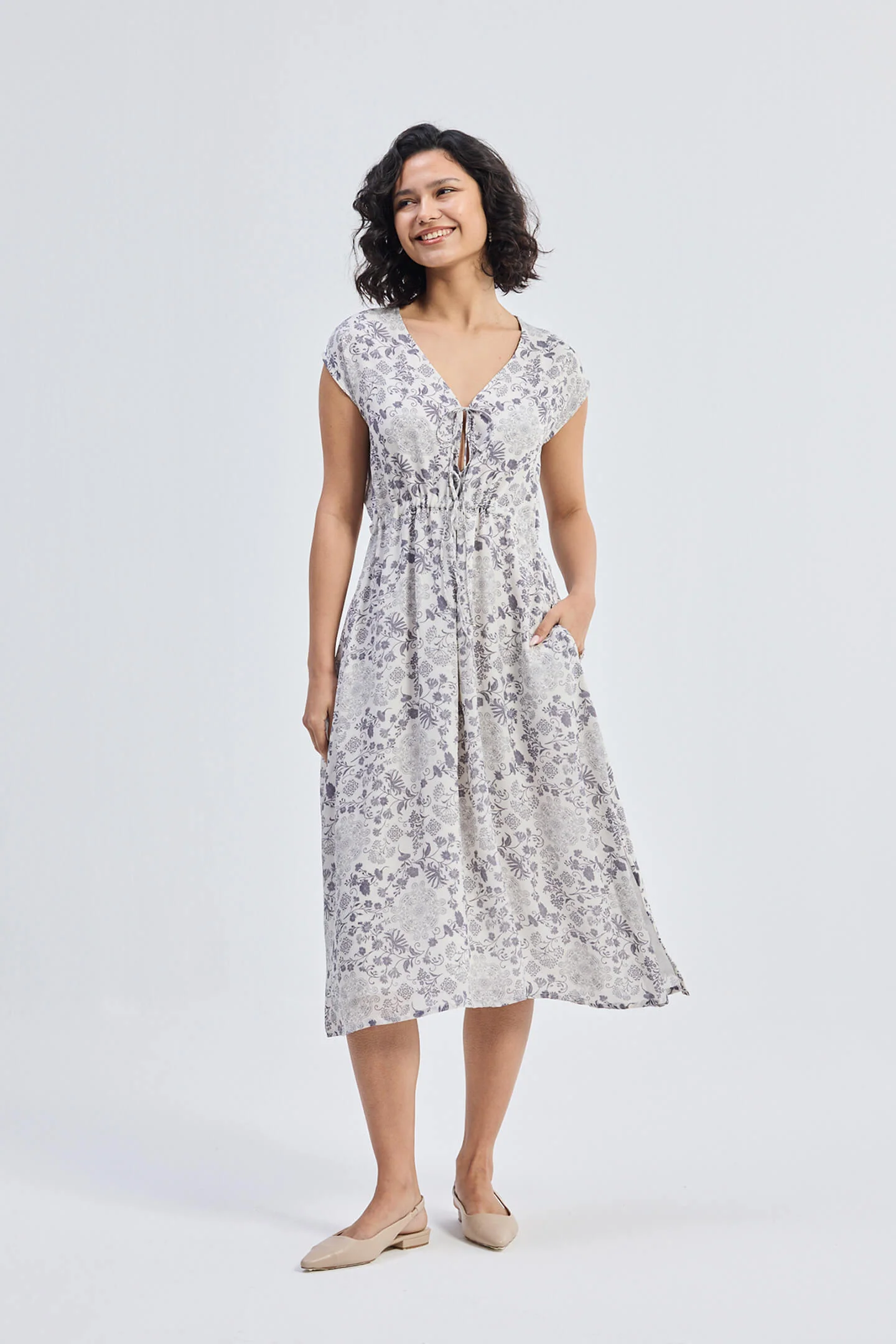Deep V-neck Gathered Dress in Florals - Image 11