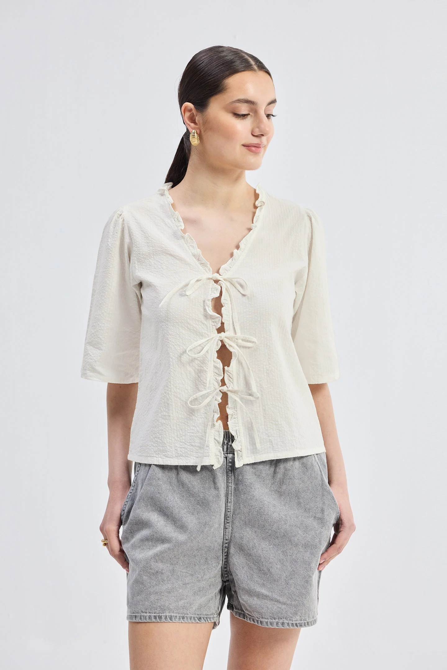 Relaxed Fit Top With Ruffles and Front-Ties in Cream - Image 3