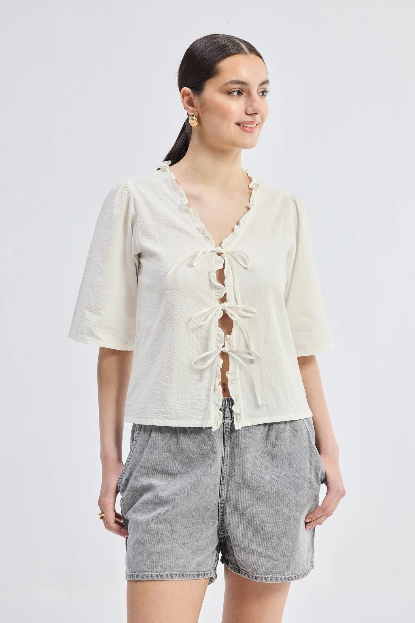 Relaxed Fit Top With Ruffles and Front-Ties in Cream - Image 4